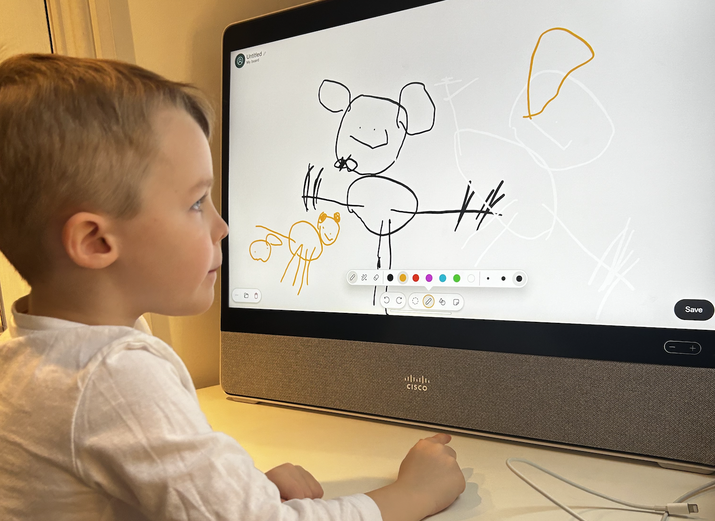 Child looking at a computer screen. 